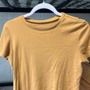 AMERICAN EAGLE tan/dark orange T-shirt. Size small